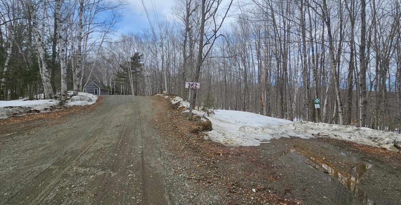 905 Driveway entrance with Gallup Road to right