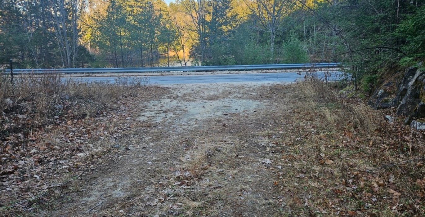 235 Gate on Birch Drive looking at River Road