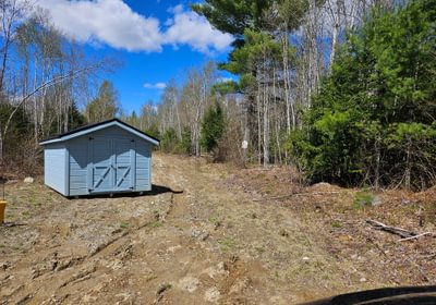 Access road with shed