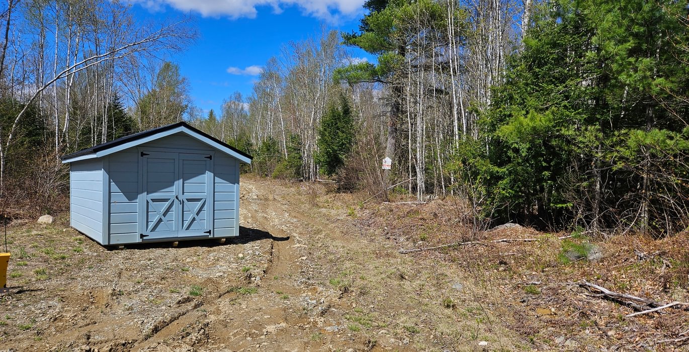 Access road with shed