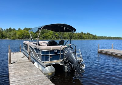 Pontoon boat mainland dock